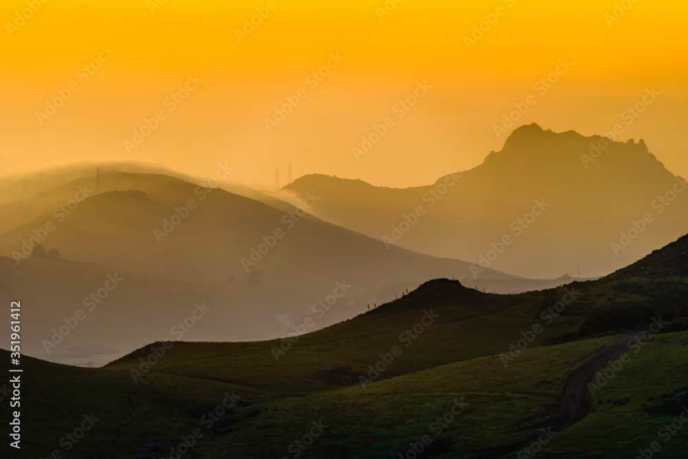 Silhouetted Mountains at Sunset, Dusk Silhouetted Mountains at Sunset, Dusk