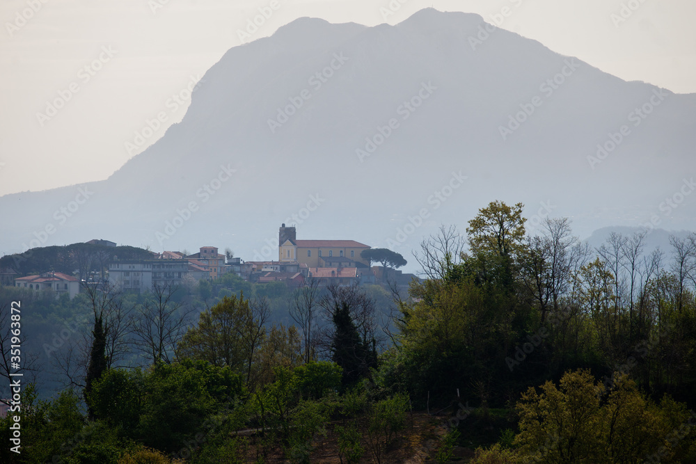 typical country of southern Italy. Montefredane, Avellino, Irpinia, Campania, Italy. The castle of Montefredane with the mount of Chiusano on the background.