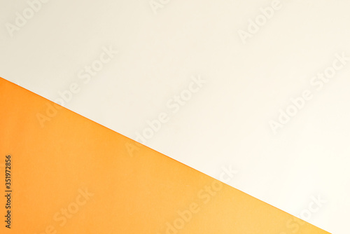 Duotone diagonal papercraft background for your creativity orange and white colors.
