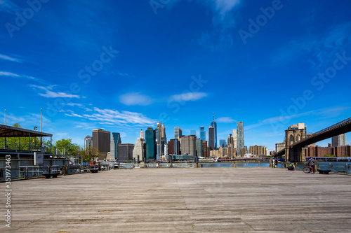 Brooklyn Bridge and Manhattan skyline as seen from Brooklyn Bridge Park, New York City © MISHELLA