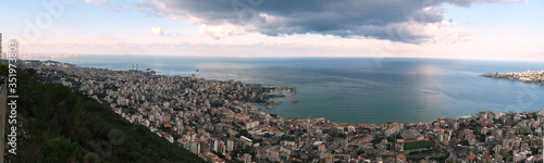 Fototapeta Naklejka Na Ścianę i Meble -  Jounieh Bay, Lebanon, with Beirut in a far end and the mediterranean shore