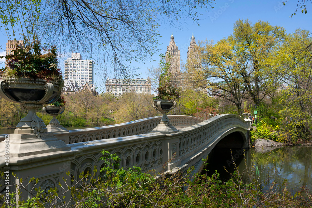 Bow bridge in Central park at spring sunny day. Manhattan
