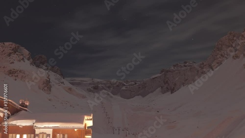 time-lapse of starts passing over a mountain top landscape