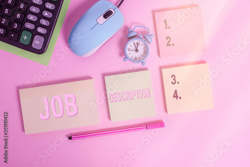 Handwriting text Job Description. Conceptual photo a formal account of an employee s is responsibilities Notepads mouse alarm clock calculator sheet marker colored background photo