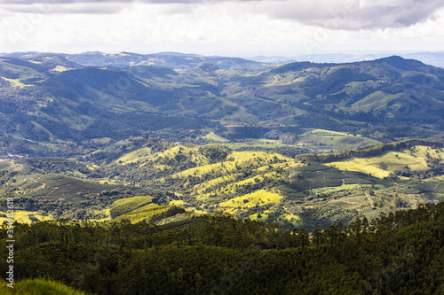 Fototapeta Naklejka Na Ścianę i Meble -  View of city of Poços de Caldas in Minas gerais in Brazil with beautiful and colorful mountains