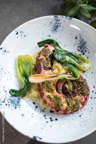 Grilled Octopus with Sauteed Greens and Herb Sauce photo