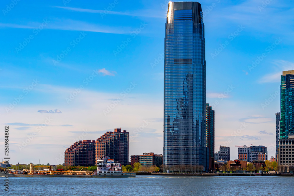 Jersey City skyline with skyscrapers over Hudson River viewed from New York City Manhattan downtown
