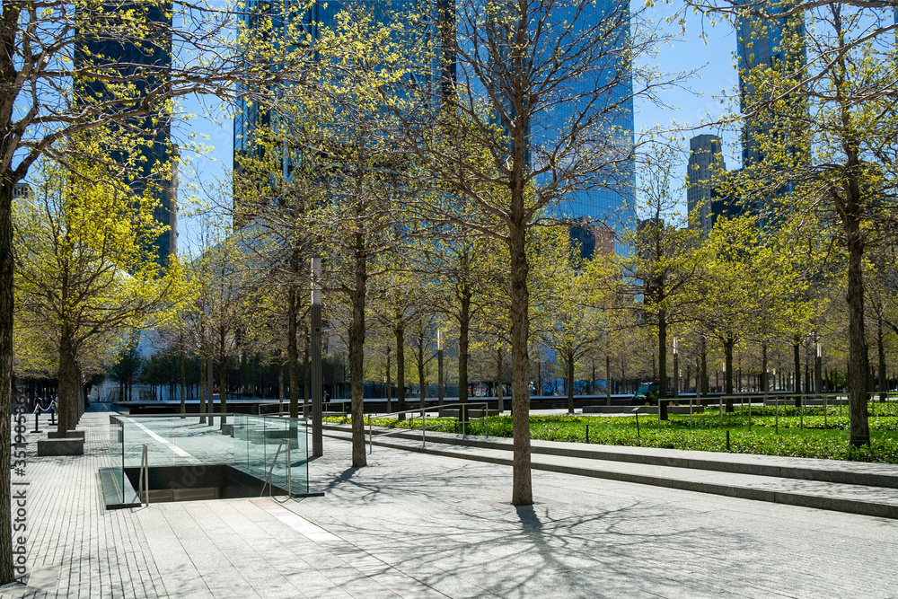New York, NY, USA - May 2, 2020: View of World Trade Center Memorial park at Lower Manhattan.
