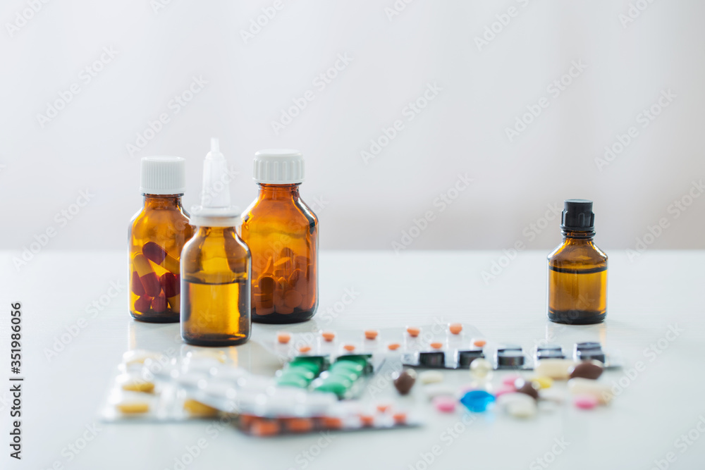 medicine bottle on table on white background medicine bottle on table on white background
