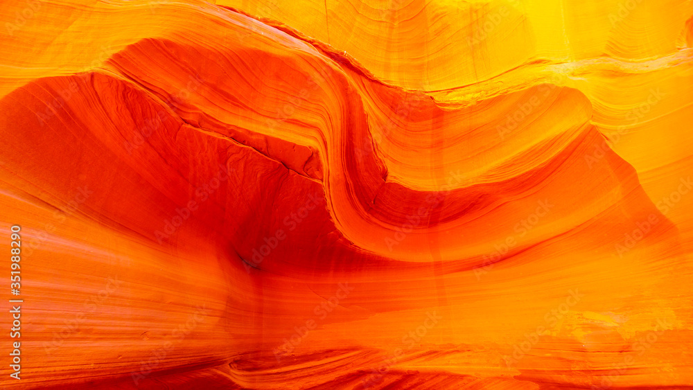 The smooth curved Red Navajo Sandstone walls of Owl Canyon, one of the famous Slot Canyons in the Navajo lands near Page Arizona, United States