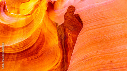 Thumbs Up. A thumb shape carved by erosion in the smooth curved Red Navajo Sandstone walls of Owl Canyon, one of the famous Slot Canyons in the Navajo lands near Page Arizona, United States