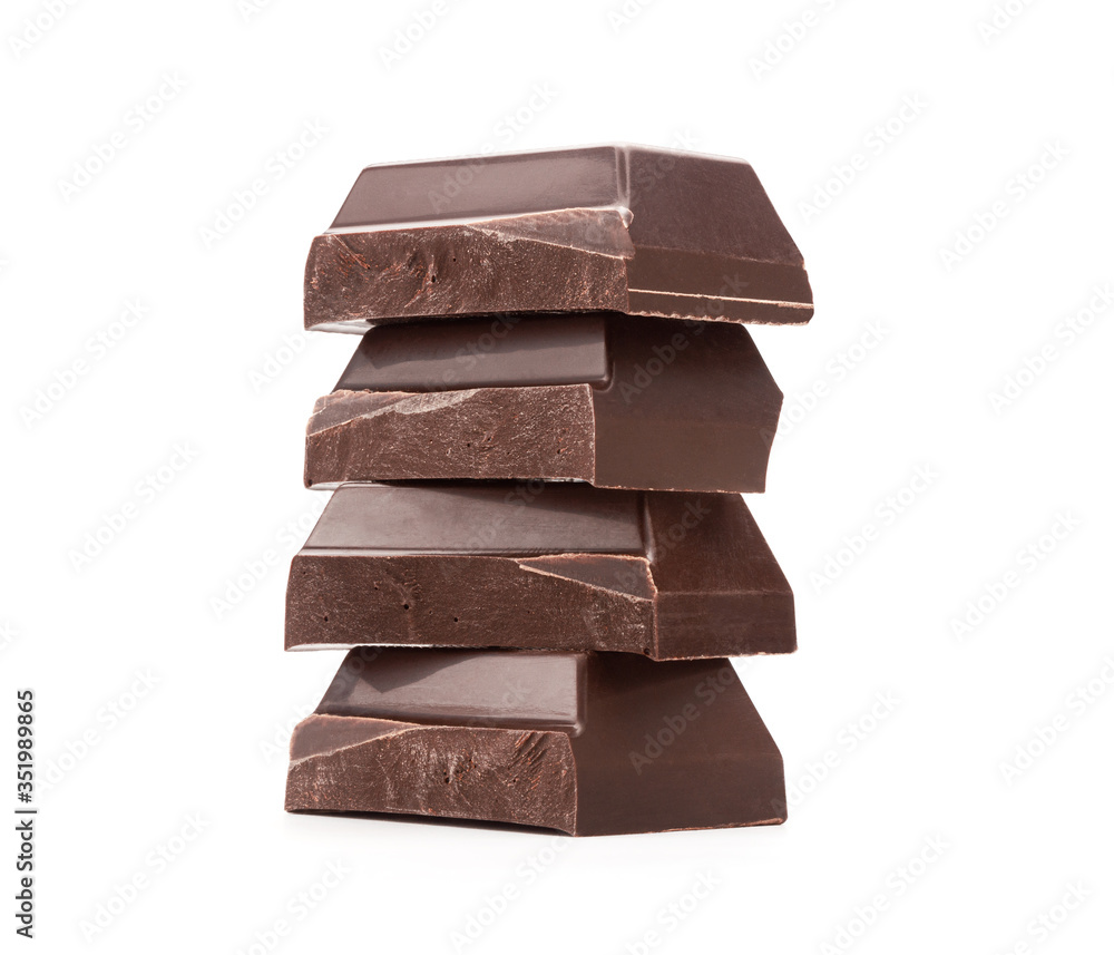 Close Up of Stack of Dark Chocolate Baking Bar Pieces Isolated on White Background Close Up of Stack of Dark Chocolate Baking Bar Pieces Isolated on White Background
