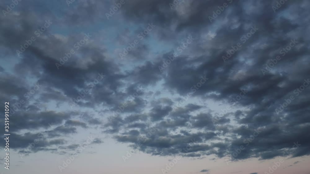 timelapse with beautiful moving clouds and birds at sunset.