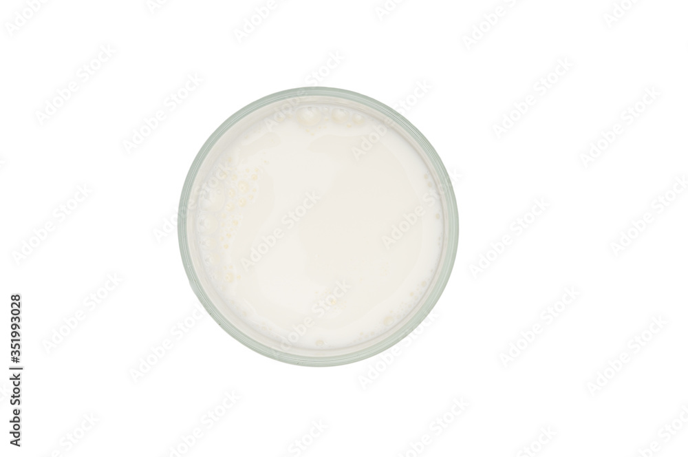 View above on milk glass isolated on white background View above on milk glass isolated on white background