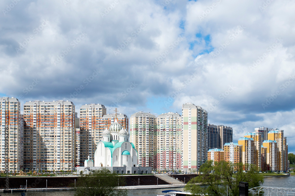 Construction of Moscow river embankment and St. Nicholas Church in new area of Pavshinsky floodplain