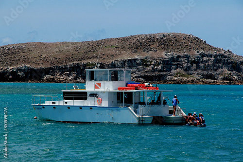 caravelas, bahia / brazil - october 22, 2012: Tourists visit island in Abrolhos Marine Park in southern Bahia. 
 photo