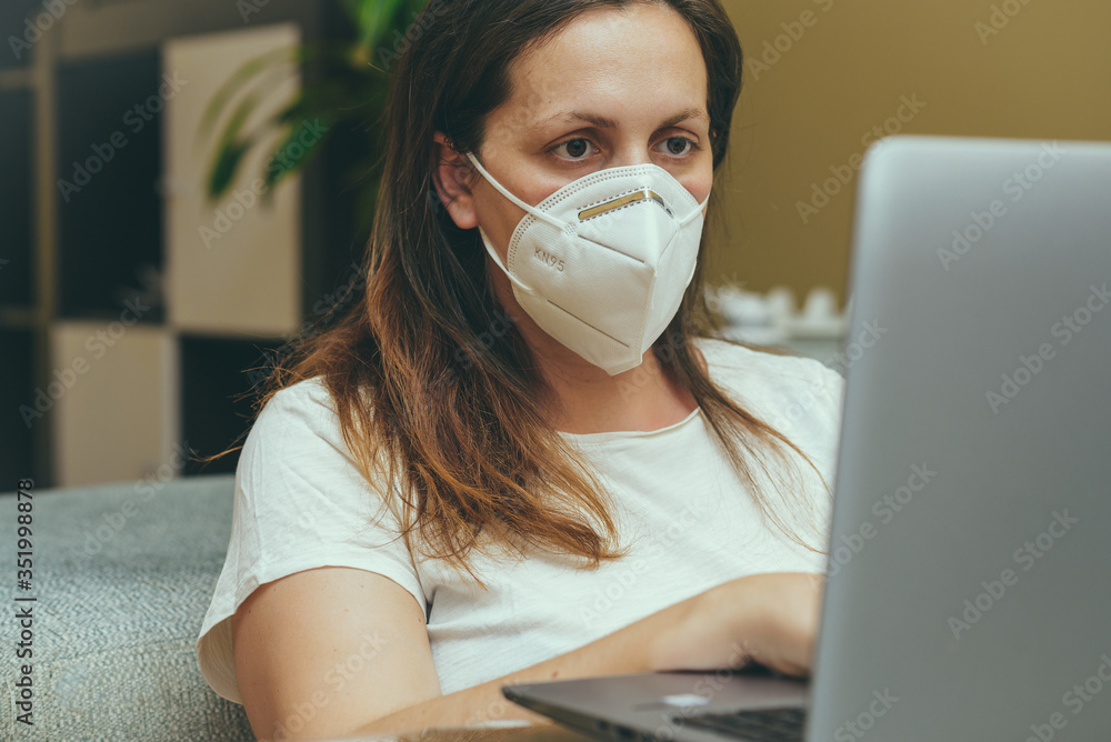 Woman working on a laptop at home and worried about covid-19 coronavirus, Business finance and saving money concept. Woman working on a laptop at home and worried about covid-19 coronavirus, Business finance and saving money concept.