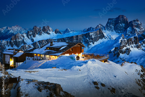 Obraz na płótnie Rifugio Lagazuoi and Cable car station against the background of the Dolomites at sunset. Winter Alps near Cortina d'Ampezzo, Veneto, Italy. Postcard, Falzarego Pass, Dolomiti. Famous observation deck w salonie