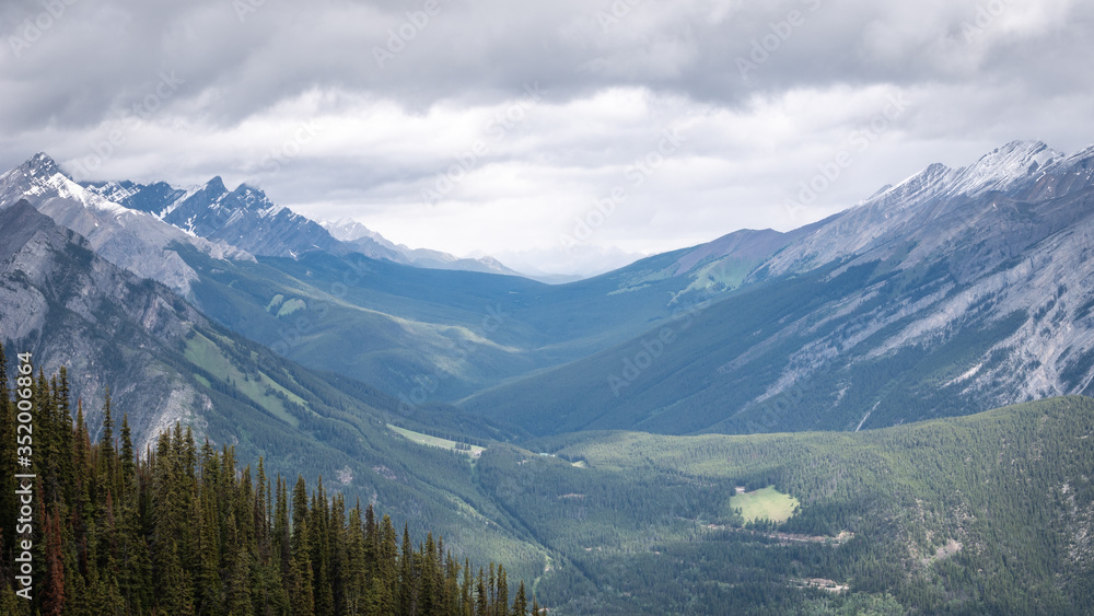 Beautiful alpine valley in Canadian Rockies,shot at Sulphur Mountain Lookout, Banff National Park, Alberta, Canada Beautiful alpine valley in Canadian Rockies,shot at Sulphur Mountain Lookout, Banff National Park, Alberta, Canada