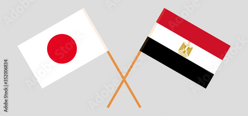 Crossed flags of Egypt and Japan