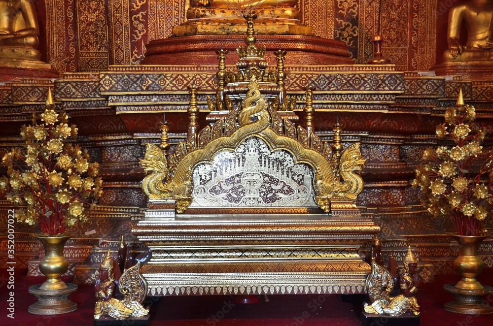 Wonderfully designed bench inside of Wat Phra Singh in Chiang Mai Wonderfully designed bench inside of Wat Phra Singh in Chiang Mai