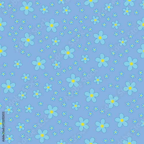 Daisies on a blue background. Seamless pattern.