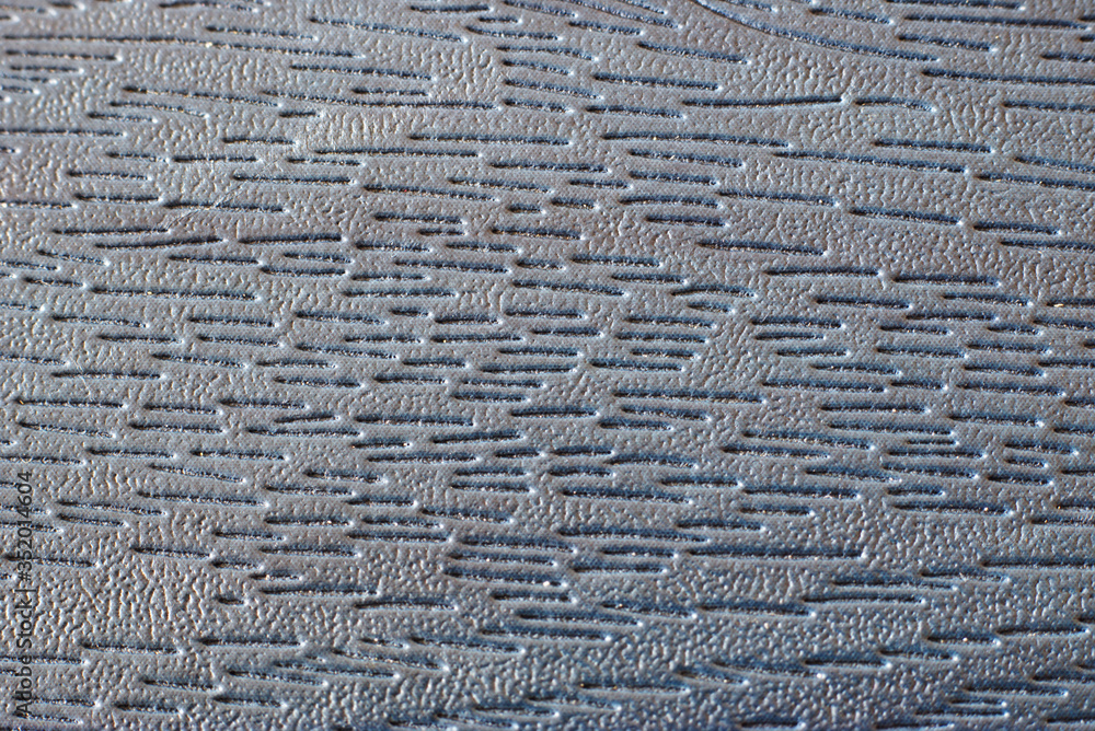 grey and blue rough leather surface