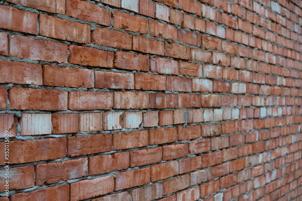 Obraz premium Red brick wall as background and texture