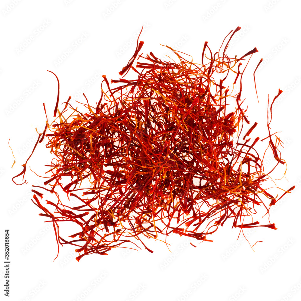 Fototapeta premium Saffron heap isolated on a white background. Top view.