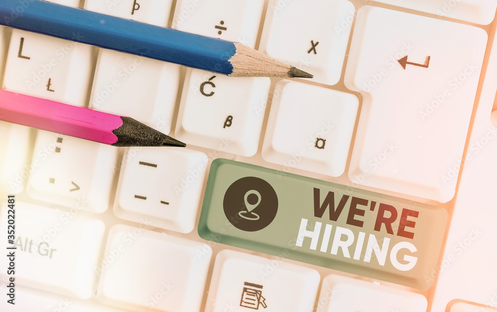 Writing note showing We Re Hiring. Business concept for process of reviewing applications and finding candidates Writing note showing We Re Hiring. Business concept for process of reviewing applications and finding candidates