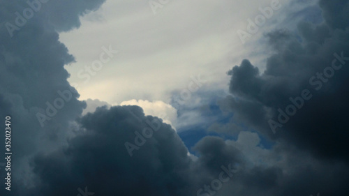 Storm clouds overtook the blue sky before the rain