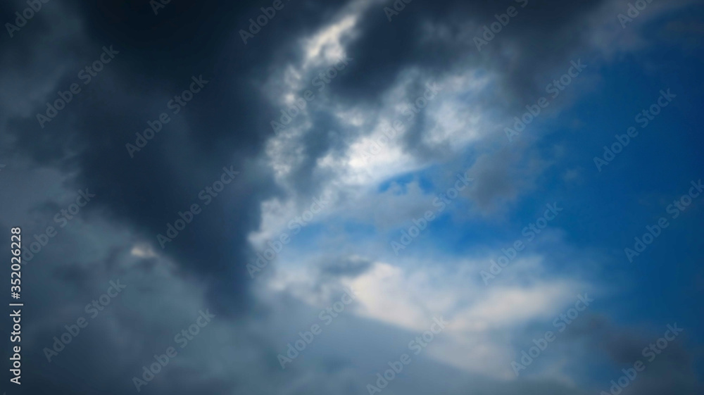 Storm clouds overtook the blue sky before the rain Storm clouds overtook the blue sky before the rain