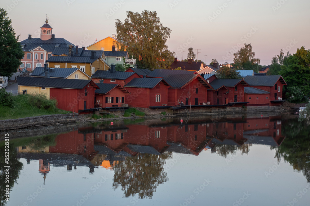 evening scene of an old town by the river