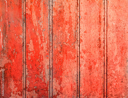 Red distressed wooden background.