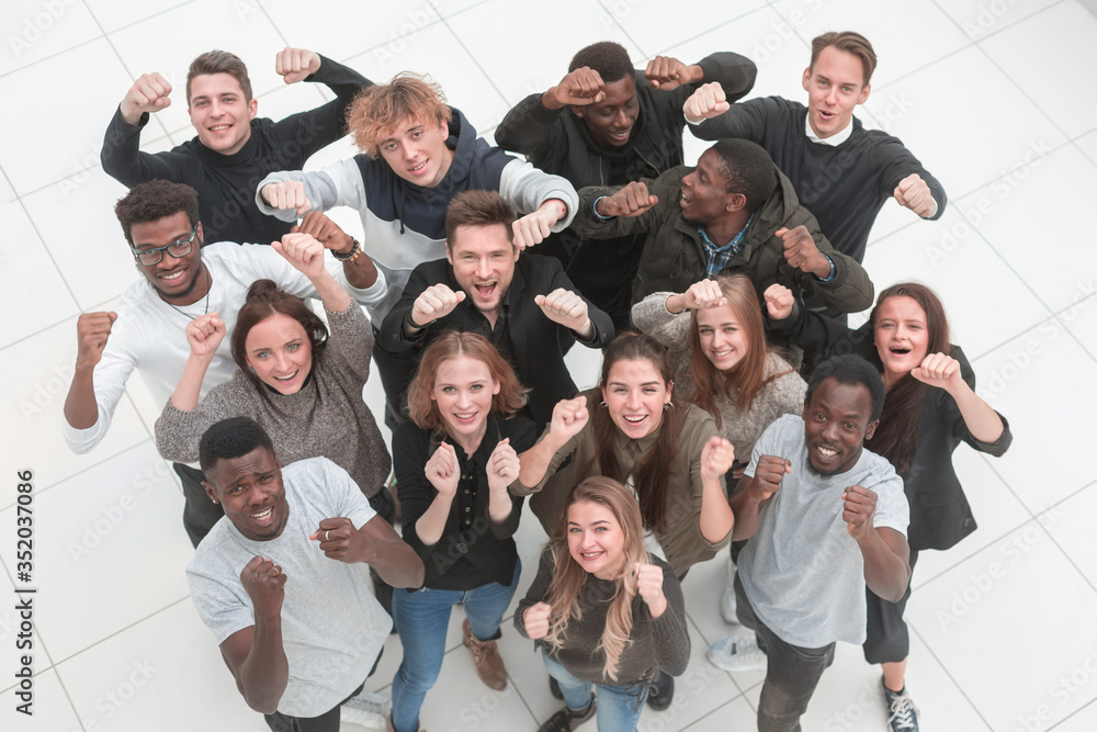 team of diverse young people looking at the camera