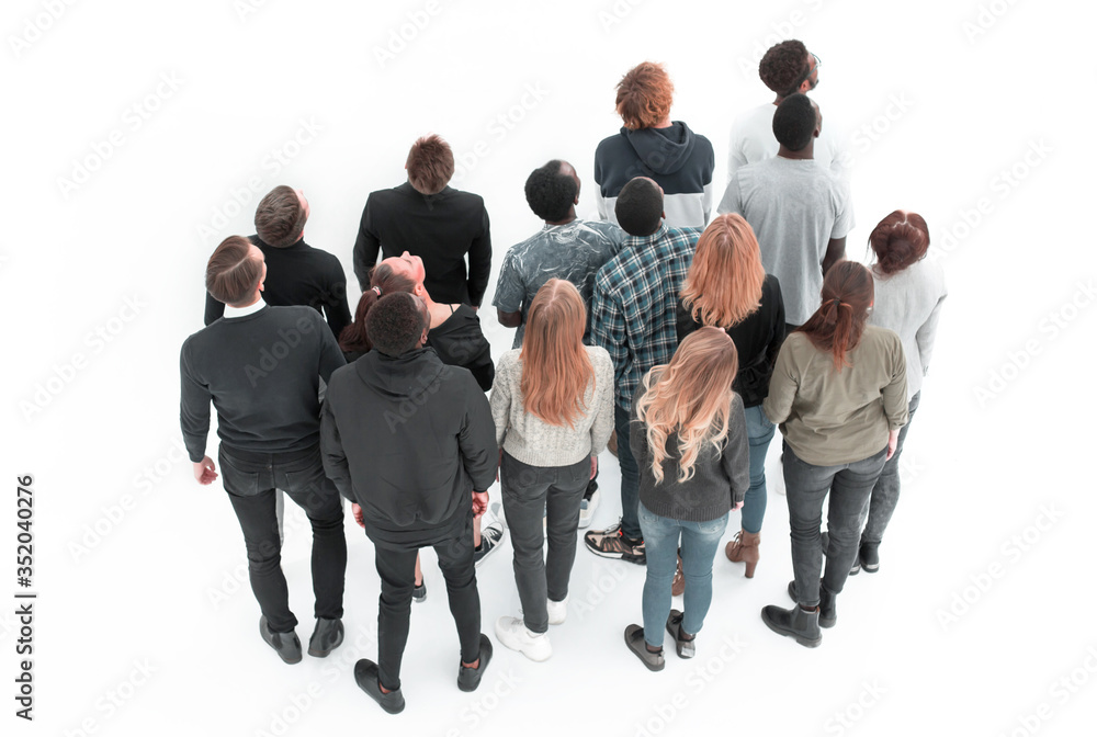 group of diverse young people looking at a white blank screen