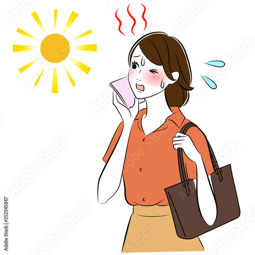 A woman wiping sweat tiring with sunburn.