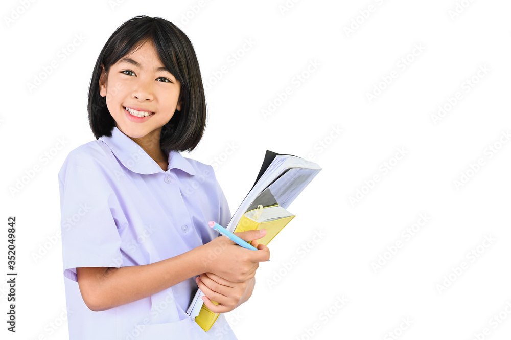 Happy school girl,Asian children holding pile books looks at camera and smile happy face on white background ,back to school concept Happy school girl,Asian children holding pile books looks at camera and smile happy face on white background ,back to school concept