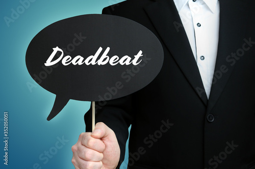 Deadbeat. Lawyer (Man) holds the sign of a speech bubble in his hand. Text on the label. Symbol of law, justice, judgement photo