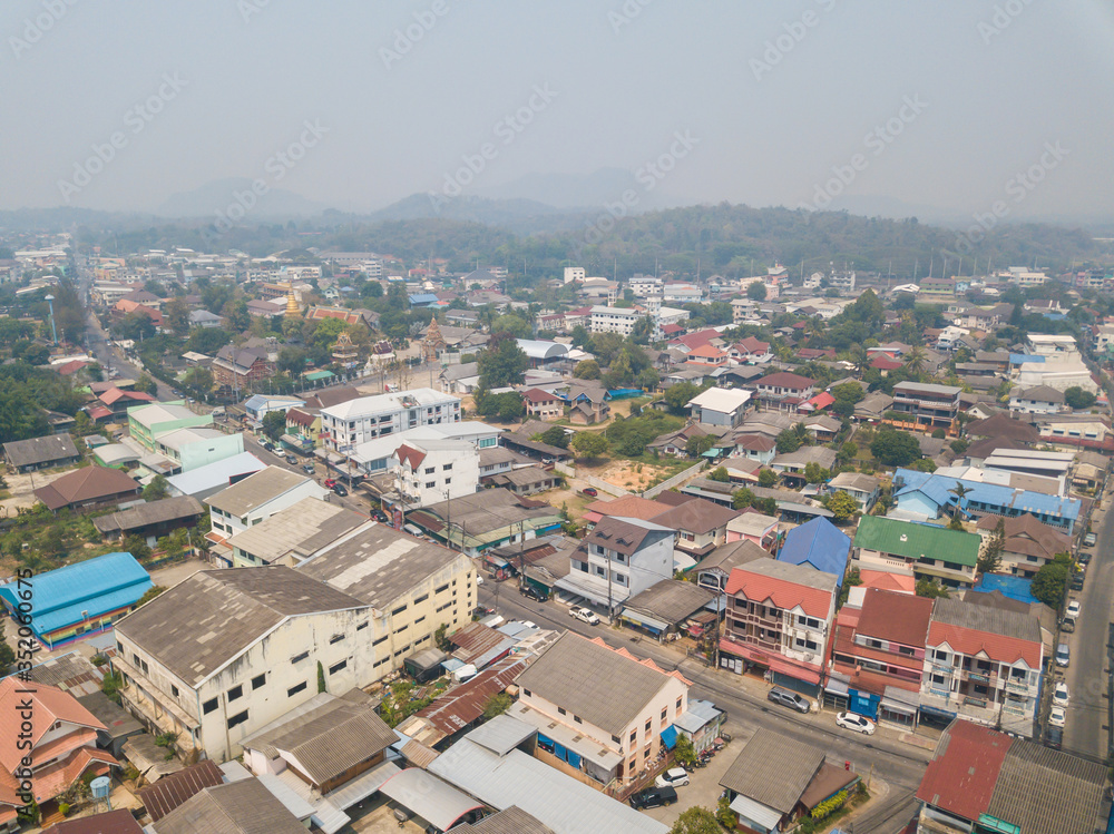 Fototapeta premium Bad air-pollution (PM2.5) covered Chiang Rai town, the Northern province in Thailand. PM2.5 levels meaning the air quality posed a health hazard.
