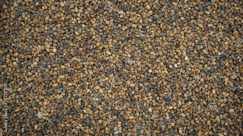 Gravel texture small stones background.
