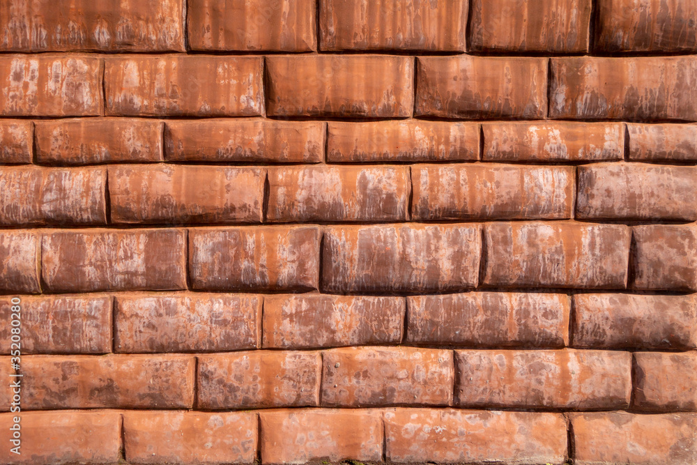 Obraz premium wall facade formed by Stucco bricks reliefs