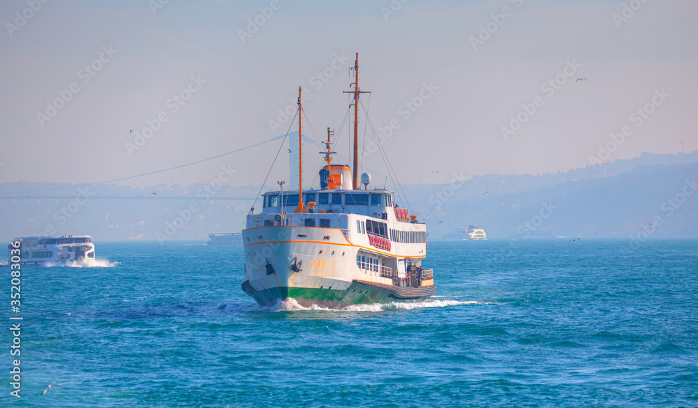Water trail foaming behind a passenger ferry boat in Bosphorus, Istanbul, Turkey Water trail foaming behind a passenger ferry boat in Bosphorus, Istanbul, Turkey