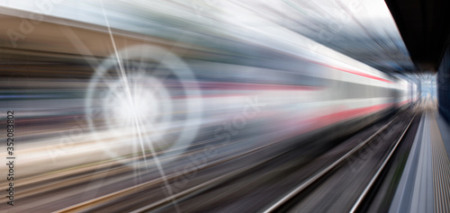 High speed train runs on rail tracks . Train in motion  © muratart