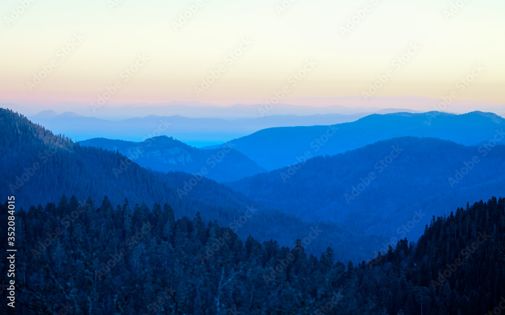 Fototapeta premium Amazing landscape with Cascade blue mountains at twilight blue hour 