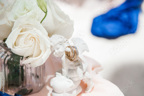 Wedding rings close up decorated nautical with accessories for tropical caribbean outdoor wedding ceremony on the sandy beach in Dominican republic  Punta Cana