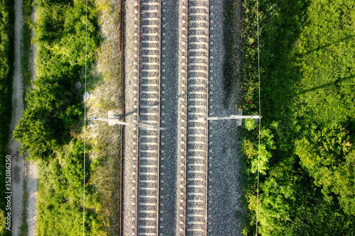 Flying over railway tracks, top view . Fototapet