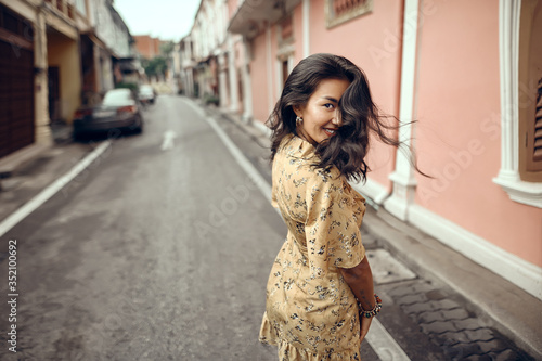 lifestyle portrait of young stylish Asian woman 