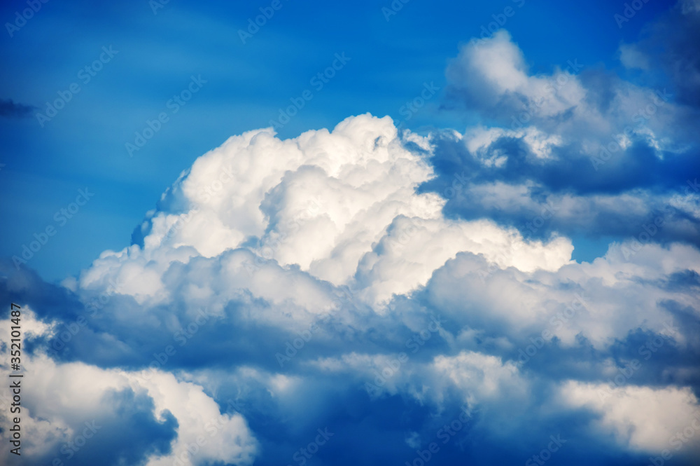 Natural sky composition. Sunny vast blue sky abstract background. Beautiful cloudscape, view over white fluffy clouds. Freedom concept, on the heaven. Element of design. Natural sky composition. Sunny vast blue sky abstract background. Beautiful cloudscape, view over white fluffy clouds. Freedom concept, on the heaven. Element of design.