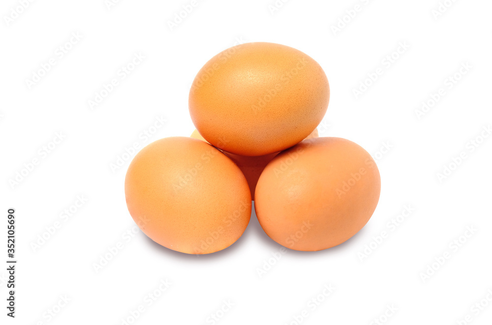 Four brown chicken eggs isolated on a white background Four brown chicken eggs isolated on a white background